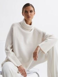Reiss EDINA RELAXED CASHMERE FUNNEL NECK JUMPER in CREAM | chic oversized raglan sleeve jumpers #2