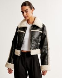 Abercrombie & Fitch Cropped Vegan Leather Shearling Jacket in Black – womens luxe style sherpa lined jackets – women’s faux fur winter outerwear