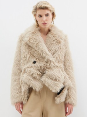 SACAI Double-breasted faux-fur coat in beige – women’s fluffy winter coats – womens luxe asymmetric hemline winter jacket - flipped