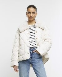 RIVER ISLAND Cream Faux Fur Collar Padded Jacket / women’s quilted jackets with removable collars