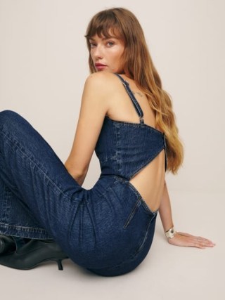 Reformation Daphne Wide Leg Denim Jumpsuit in Huntington – blue strappy cut out back jumpsuits p - flipped