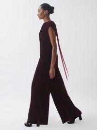 REISS FLORERE RELAXED FIT VELVET TIE NECK JUMPSUIT in BURGUNDY / luxury rich red occasion jumpsuits with tonal pink ties
