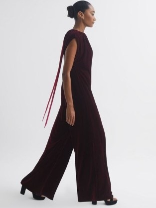 REISS FLORERE RELAXED FIT VELVET TIE NECK JUMPSUIT in BURGUNDY / luxury rich red occasion jumpsuits with tonal pink ties p - flipped