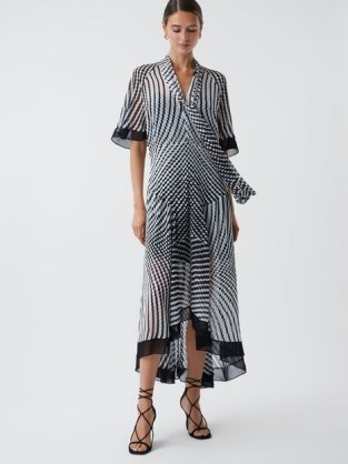REISS ANAYA CHECK REMOVABLE NECK TIE MIDI DRESS in BLACK / WHITE – flowing asymmetric dresses – monochrome print occasion clothing p - flipped