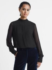RILEY SHEER HIGH NECK BLOUSE BLACK – minimalist blouses – sophisticated tops