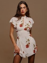 Reformation Vaeda Dress in American Beauty / white and red floral print mini / flutter sleeve high neck mini dresses / fitted bodice with A-line skirt / feminine fashion