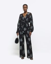 RIVER ISLAND Black Glitter Floral Belted Jumpsuit ~ glittering sheer sleeve tie waist jumpsuits ~ women’s all in one party fashion