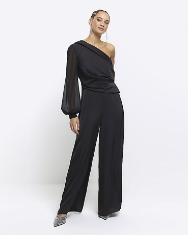 River Island Black Satin One Shoulder Wide Leg Jumpsuit | women’s asymmetric one sleeve jumpsuits | womens all in one party fashion