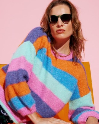 OLIVER BONAS Fluffy Rainbow Knitted Jumper in Pink | multicoloured striped jumpers | women’s balloon sleeve sweater - flipped