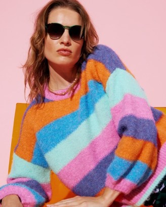 OLIVER BONAS Fluffy Rainbow Knitted Jumper in Pink | multicoloured striped jumpers | women’s balloon sleeve sweater