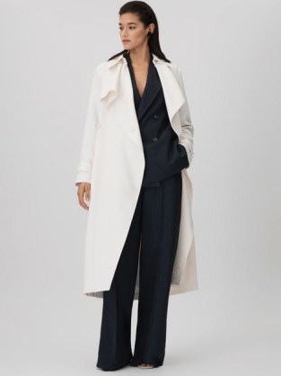 REISS ETTA DOUBLE BREASTED BELTED TRENCH COAT in WHITE – women’s luxe longline coats – womens chic outerwear – luxury clothing - flipped