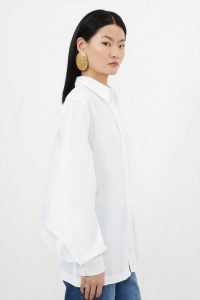 KAREN MILLEN Tailored Cutout Sleeve Detail Asymmetric Shirt in White / women’s chic contemporary shirts / womens cut out detail clothing
