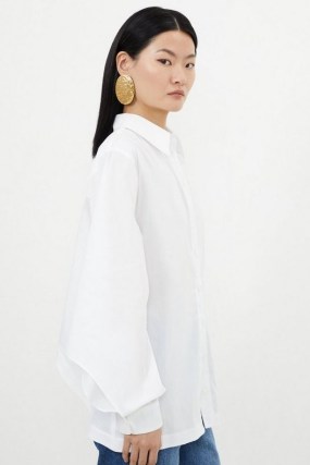 KAREN MILLEN Tailored Cutout Sleeve Detail Asymmetric Shirt in White / women’s chic contemporary shirts / womens cut out detail clothing