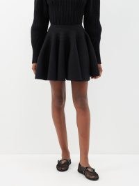 ALAÏA Ribbed wool-blend mini skirt in black – women’s full mini skirts