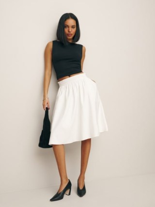 Reformation Dove Skirt in White – women’s pull on smocked waist A-line skirts - flipped