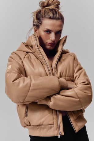 alo yoga FAUX LEATHER BOSS PUFFER in TOASTED ALMOND – oversized padded jackets – women’s fashionable winter outerwear - flipped