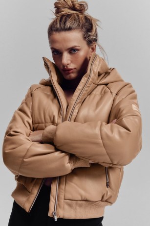 alo yoga FAUX LEATHER BOSS PUFFER in TOASTED ALMOND – oversized padded jackets – women’s fashionable winter outerwear