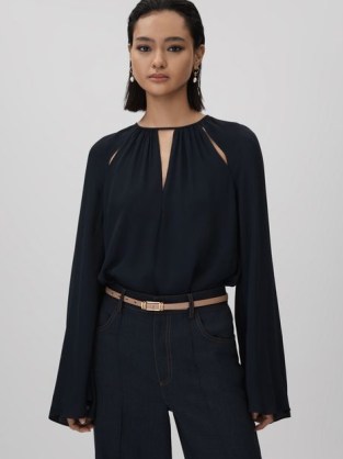 REISS GRACIE CUT-OUT FLUTE SLEEVE BLOUSE in NAVY – dark blue cutout blouses with flared sleeves - flipped