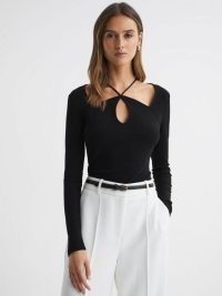 REISS SYLVIE JERSEY CUT-OUT STRAPPY TOP in BLACK – long sleeve fitted cutout tops
