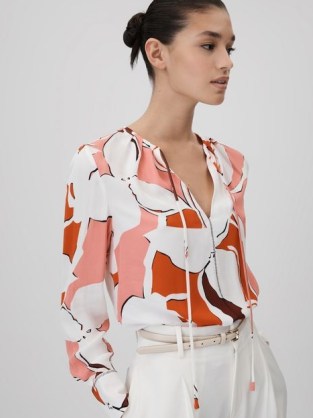 REISS TESS PRINTED TIE NECK BLOUSE CREAM/RED ~ red, cream and pink abstract floral print blouses - flipped