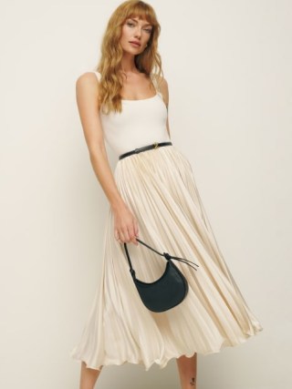 Reformation Bala Satin Skirt in Ivory – silky pleated midi skirts – luxe fashion