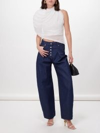 Jacquemus Pleated curved wide-leg jeans | women’s dark blue cork and cotton blend denim fashion