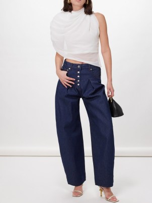 Jacquemus Pleated curved wide-leg jeans | women’s dark blue cork and cotton blend denim fashion