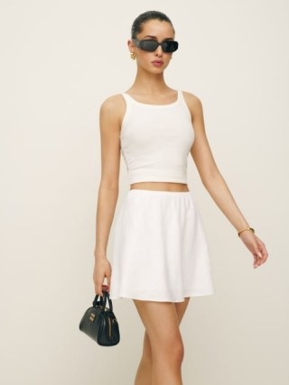 Reformation Brandy Linen Skirt in White / chic A-line mini skirts / spring and summer fashion 2024 - flipped