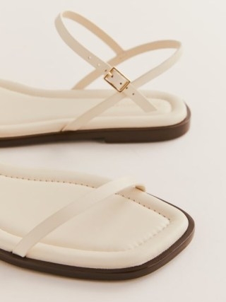 Reformation Lake Flat Sandal in Almond Leather ~ luxe off white flats ~ strappy summer sandals - flipped
