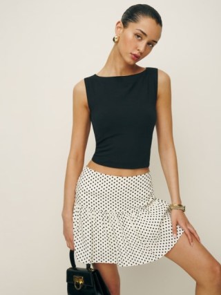Reformation Mabel Skirt in Eclipse Dot / white pleated spot print mini skirts / polka dot fashion