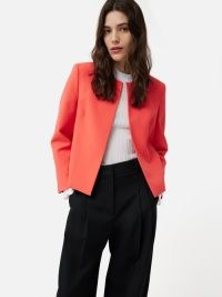 JIGSAW Modern Crepe Short Jacket in Coral / women’s bright orange collarless open front jackets