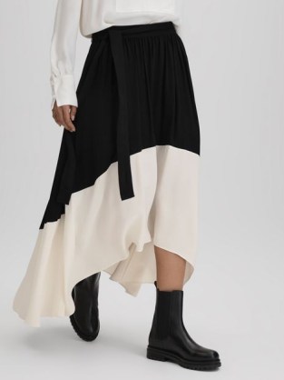 Reiss AVA COLOURBLOCK PLEATED MIDI SKIRT BLACK/CREAM ~ colour block dip hem skirts ~ asymmetric hemline clothing