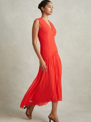 Reiss SAFFY RUCHED BODYCON MIDI DRESS in CORAL – bright asymmetric occasion dresses – vibrant evening event clothing