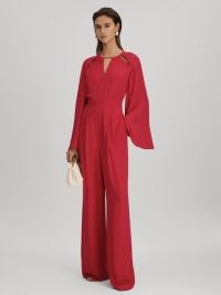 REISS TANIA CUT-OUT FLARED SLEEVE JUMPSUIT CORAL ~ wide sleeved cutout jumpsuits ~ open back evening fashion ~ women’s chic all-in-one occasion clothes