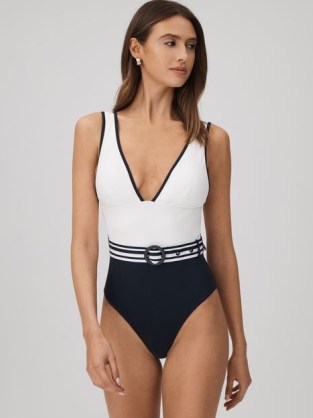 REISS WILLOW COLOURBLOCK BELTED SWIMSUIT in WHITE/NAVY / white and navy blue colour block high leg swumsuits / deep plunge front swimwear - flipped