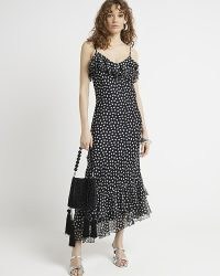 River Island Black Ruffle Asymmetric Spot Midi Dress | ruffled polka dot slip dresses | strappy evening fashion
