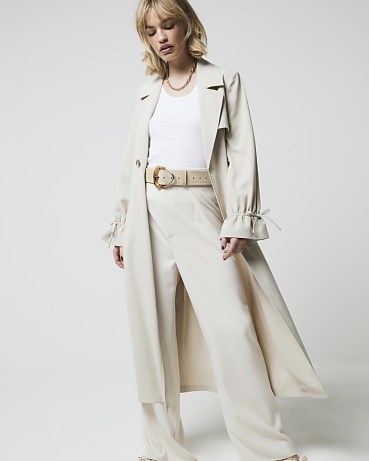 River Island Cream Tie Cuff Belted Duster Coat | women’s chic longline trench coats - flipped