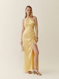 Reformation Myla Silk Dress in Sunshine / silky yellow halterneck maxi dresses / luxury occasion fashion / luxe event clothing