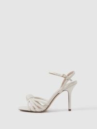 REISS ESTEL STRAPPY PEARL HEELED SANDALS CREAM – glamorous embellished front knot sandal – luxe style knotted occasion heels