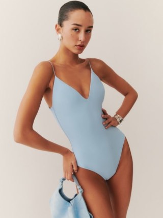 Reformation Rio One Piece Swimsuit in Mineral – spaghetti strap swimsuit – light blue plunge front swimsuits – sustainable swimwear
