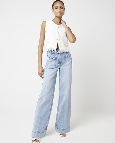 River Island Blue High Waisted Flared Wide Leg Jeans | vintage style denim fashion - flipped