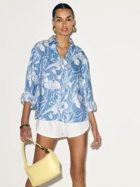 Reformation Andy Oversized Linen Shirt in Cozumel – women’s relaxed blue and white floral shirts – chic summer looks