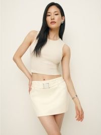 Reformation Carla Low Waist Belted Satin Skirt in Sugar | luxe mini skirts